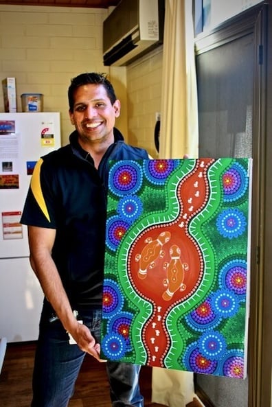 Dr Prashan Kuruppi with artwork